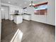 Modern kitchen featuring white cabinets and an island at 7627 Alexander Hills St, Las Vegas, NV 89139