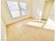 Spacious bedroom with tile floors and large windows at 8250 N Grand Canyon Dr # 1105, Las Vegas, NV 89166