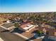 Single-story home, red tile roof, and a spacious backyard in a residential area at 9037 Grayling Dr, Las Vegas, NV 89134