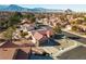 Single-story home with red tile roof, desert landscaping, and mountain views at 9037 Grayling Dr, Las Vegas, NV 89134