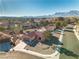 Single-story home with red tile roof and desert landscaping, mountain backdrop at 9037 Grayling Dr, Las Vegas, NV 89134