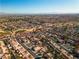 Aerial view of neighborhood showing homes and green spaces at 9037 Grayling Dr, Las Vegas, NV 89134