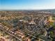 Aerial view of community center, pool, and tennis courts at 9037 Grayling Dr, Las Vegas, NV 89134