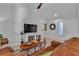 Living room featuring tile floors, fireplace and leather couches at 9037 Grayling Dr, Las Vegas, NV 89134