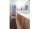 Elegant bathroom with double sinks and a view of bedroom at 904 Kevin Baker Ave, North Las Vegas, NV 89086