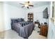 Well-lit bedroom with a double bed and bookcase at 904 Kevin Baker Ave, North Las Vegas, NV 89086