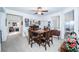 Spacious dining area with a square table and six chairs at 904 Kevin Baker Ave, North Las Vegas, NV 89086