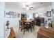 Bright dining room with square table and wood hutch at 904 Kevin Baker Ave, North Las Vegas, NV 89086