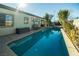 Stunning pool and spa in a sun-drenched backyard at 904 Kevin Baker Ave, North Las Vegas, NV 89086