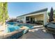 Inviting backyard oasis with a sparkling pool and spa at 904 Kevin Baker Ave, North Las Vegas, NV 89086