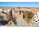 Aerial view of a two-story house with solar panels and a two-car garage at 9328 Black Wolf Ave, Las Vegas, NV 89178