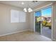 Bright dining area with access to a balcony at 9328 Black Wolf Ave, Las Vegas, NV 89178