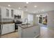 Modern kitchen with stainless steel appliances and granite countertops at 9328 Black Wolf Ave, Las Vegas, NV 89178