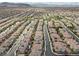 Aerial view of houses and streets in a residential community at 9625 Ponderosa Skye Ct, Las Vegas, NV 89166