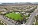 Aerial view of community park with playground, landscaping and mature trees at 9625 Ponderosa Skye Ct, Las Vegas, NV 89166