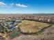 Expansive aerial view of the community showcasing the playground, basketball court and common area at 9625 Ponderosa Skye Ct, Las Vegas, NV 89166