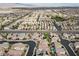 Aerial view of a neighborhood with houses and landscaping at 9625 Ponderosa Skye Ct, Las Vegas, NV 89166