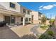 Private backyard featuring a covered patio, gravel landscape, and low-maintenance design at 9625 Ponderosa Skye Ct, Las Vegas, NV 89166