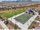 Well-maintained community basketball court with playground and walking paths, surrounded by neighborhood homes at 9625 Ponderosa Skye Ct, Las Vegas, NV 89166