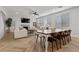 Dining area with a farmhouse table and wood chairs at 9625 Ponderosa Skye Ct, Las Vegas, NV 89166