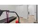 This is a home gym with a treadmill and bright, natural light at 9625 Ponderosa Skye Ct, Las Vegas, NV 89166