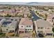 Aerial view of a two-story home with a tile roof and neutral-colored exterior, complimented by a well-kept backyard at 9625 Ponderosa Skye Ct, Las Vegas, NV 89166