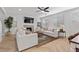 Bright living room with fireplace and herringbone floors at 9625 Ponderosa Skye Ct, Las Vegas, NV 89166