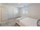 Cozy bedroom with gray carpet and ample closet space at 10774 Blore Ct, Las Vegas, NV 89166