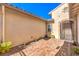 Small courtyard with brick pavers and drought-resistant plants at 12160 Torretta Ct, Las Vegas, NV 89138