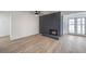 Living room featuring a fireplace and hardwood floors at 1302 Cherokee Ln, Las Vegas, NV 89106