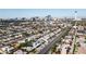An aerial shot of homes with a distant view of a city skyline including the Stratosphere Tower at 1409 E St Louis Ave # A, Las Vegas, NV 89104