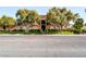 Charming two-story home with well-manicured landscaping, mature trees, and a unique architectural design at 1409 E St Louis Ave # A, Las Vegas, NV 89104
