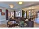Open concept living space with sectional sofa and access to patio at 1409 E St Louis Ave # A, Las Vegas, NV 89104
