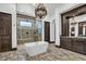 Spa-like Primary bathroom with soaking tub, walk-in shower, and and vanities at 1616 Villa Rica Dr, Henderson, NV 89052