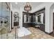 Luxurious Primary bathroom with a large soaking tub, walk-in shower, and ample storage at 1616 Villa Rica Dr, Henderson, NV 89052