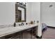 Vanity with marble countertop and dark wood cabinets at 1616 Villa Rica Dr, Henderson, NV 89052