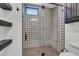 Shower with patterned tile and built-in bench at 1616 Villa Rica Dr, Henderson, NV 89052
