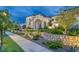 Luxury home with beautifully landscaped yard and stone retaining walls at 1616 Villa Rica Dr, Henderson, NV 89052