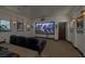 Home theater room with plush seating and large projection screen at 1616 Villa Rica Dr, Henderson, NV 89052