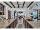Gourmet kitchen boasts expansive island, granite counters, and high-end appliances at 1616 Villa Rica Dr, Henderson, NV 89052