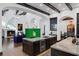 Open kitchen with large island, dark cabinetry, and views into the living room at 1616 Villa Rica Dr, Henderson, NV 89052