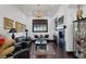 Elegant living room with dark hardwood floors and fireplace at 1616 Villa Rica Dr, Henderson, NV 89052