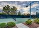 Well-maintained tennis court with surrounding landscaping at 1616 Villa Rica Dr, Henderson, NV 89052