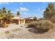 Private backyard with desert landscaping and mature trees at 2101 Desert Woods Dr, Henderson, NV 89012