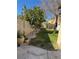 Landscaped backyard with grass and plants at 2621 Slide Canyon Ave, North Las Vegas, NV 89081