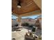 Covered patio with seating and fountain feature at 2621 Slide Canyon Ave, North Las Vegas, NV 89081