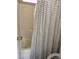 Bathroom with shower/tub combo and patterned shower curtain at 2621 Slide Canyon Ave, North Las Vegas, NV 89081