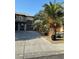 Two-story home with palm trees and driveway at 2621 Slide Canyon Ave, North Las Vegas, NV 89081