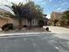 Landscaped yard with palm trees and driveway at 2621 Slide Canyon Ave, North Las Vegas, NV 89081