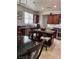Modern kitchen with granite countertops, island, and stainless steel appliances at 2621 Slide Canyon Ave, North Las Vegas, NV 89081